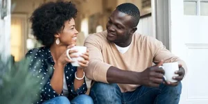 partner-in-recovery-bipolar-disorder-couple-black-conversation-coffee-882197436